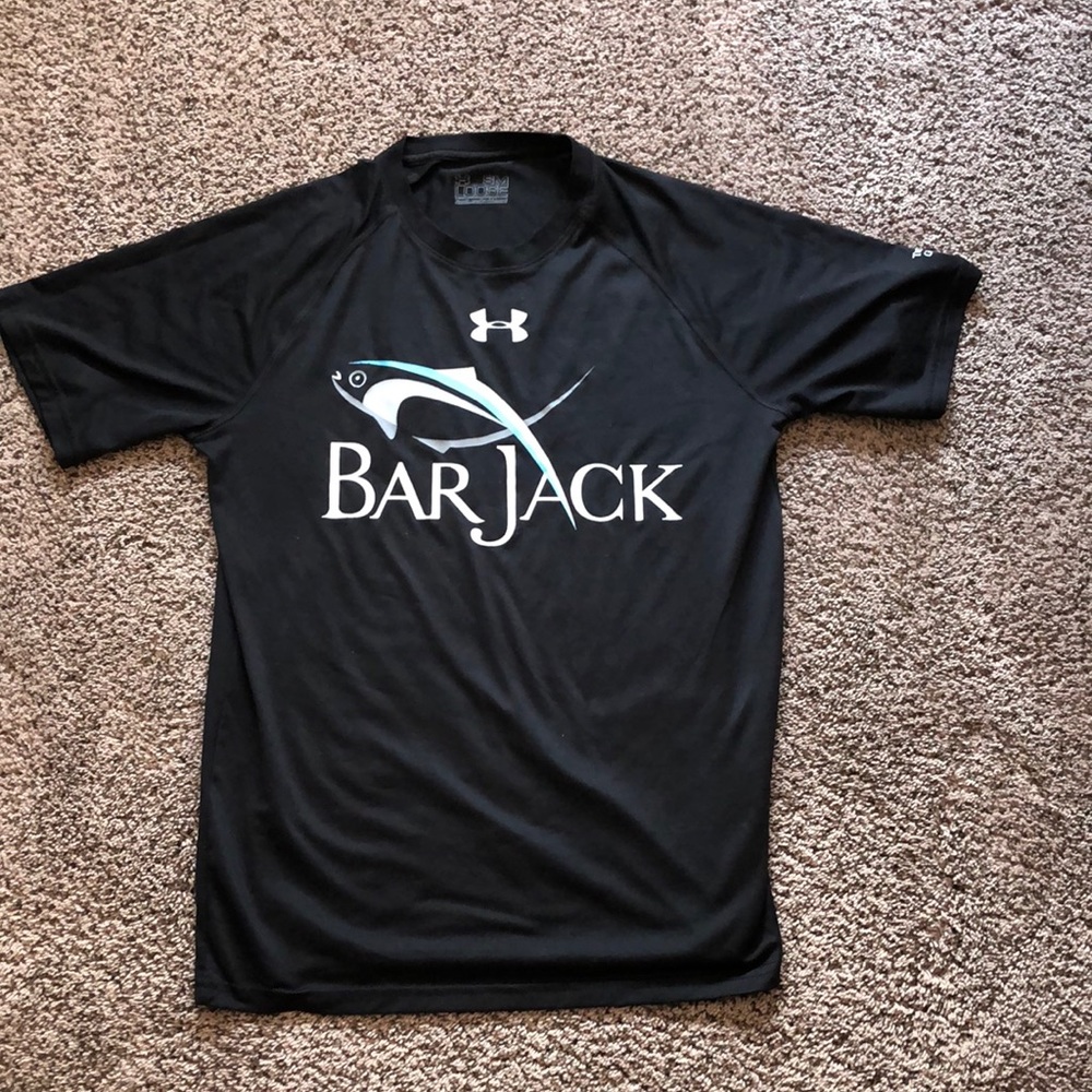 Under Armour 100% polyester shirt. Slightly worn, size small.